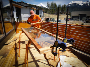 Fabricating a sliding glass door out of reclaimed materials at Sven's.